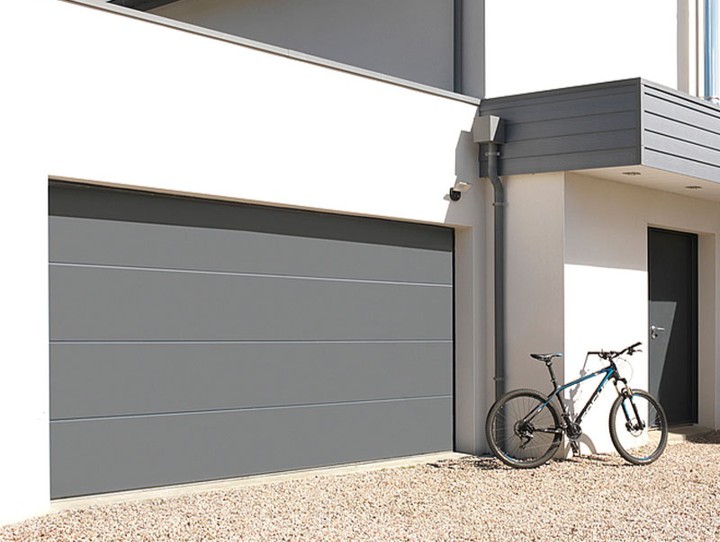 Portes de garage sectionnelles, enroulables et latérales